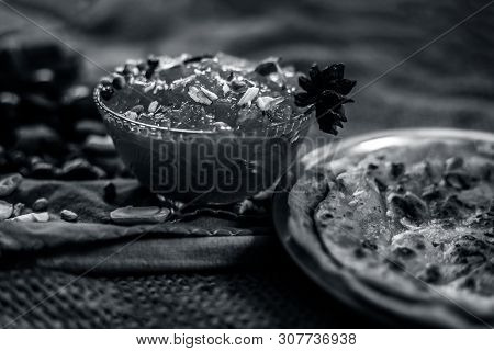 Famous Mango Preservation I.e. Murba Or Murabba In A Glass Bowl On Jute Bags Surface Along With Dry