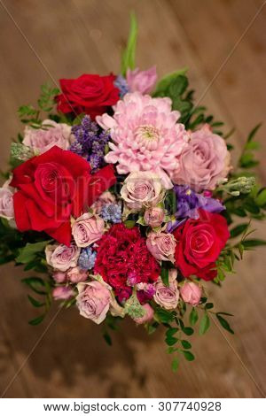 Bouquet Of Flowers On A Leg In The Interior Of The Restaurant For A Celebration Shop Floristry Or We