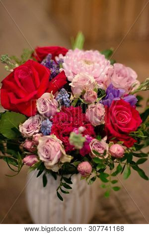 Bouquet Of Flowers On A Leg In The Interior Of The Restaurant For A Celebration Shop Floristry Or We