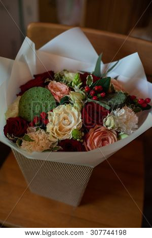 Bouquet Of Flowers On A Leg In The Interior Of The Restaurant For A Celebration Shop Floristry Or We