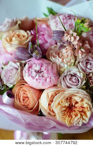 Bouquet Of Flowers On A Leg In The Interior Of The Restaurant For A Celebration Shop Floristry Or We