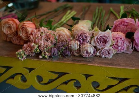 Bouquet Of Flowers On A Leg In The Interior Of The Restaurant For A Celebration Shop Floristry Or We