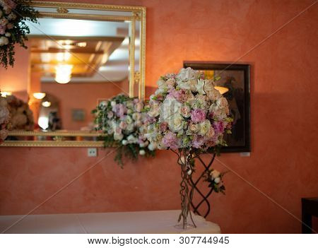 Bouquet Of Flowers On A Leg In The Interior Of The Restaurant For A Celebration Shop Floristry Or We