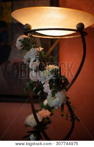 Bouquet Of Flowers On A Leg In The Interior Of The Restaurant For A Celebration Shop Floristry Or We