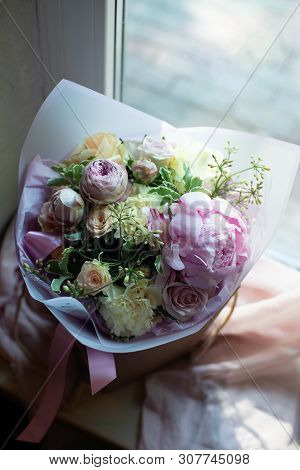 Bouquet Of Flowers On A Leg In The Interior Of The Restaurant For A Celebration Shop Floristry Or We