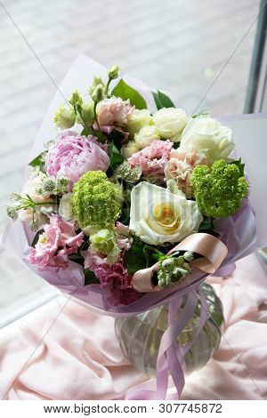Bouquet Of Flowers On A Leg In The Interior Of The Restaurant For A Celebration Shop Floristry Or We