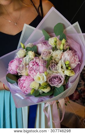 Bouquet Of Flowers On A Leg In The Interior Of The Restaurant For A Celebration Shop Floristry Or We