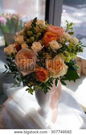 Bouquet Of Flowers On A Leg In The Interior Of The Restaurant For A Celebration Shop Floristry Or We
