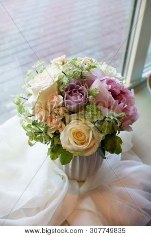 Bouquet Of Flowers On A Leg In The Interior Of The Restaurant For A Celebration Shop Floristry Or We