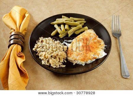 Tilapia Parmesan måltid