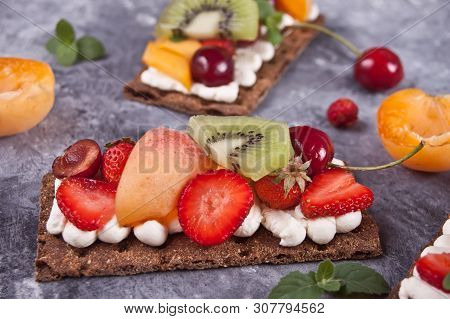 Crisp Bread With Creme Cheese, Fruit And Berries