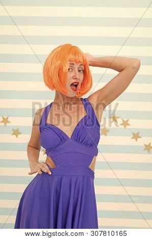 Modern Hair Coloring At Hairdresser Salon. Crazy Girl Made Hair Coloring In Orange Color. Crazy Look