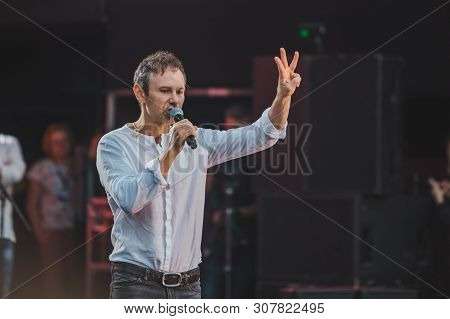 Lviv, Ukraine - June 18, 2019: Vakarchuk At Stage Talking In Microphone. Political