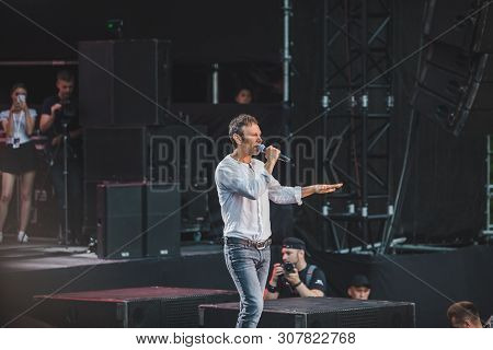 Lviv, Ukraine - June 18, 2019: Vakarchuk At Stage Talking In Microphone. Political