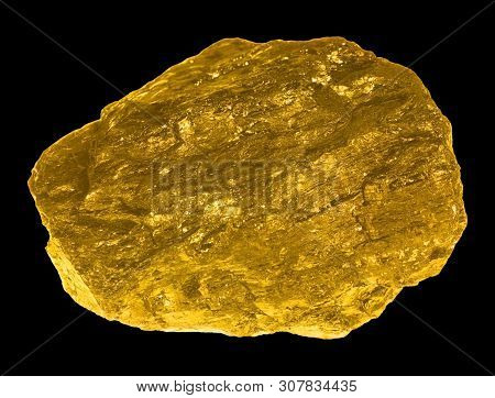 A Piece Of Coal Before Exemptly Black Background.