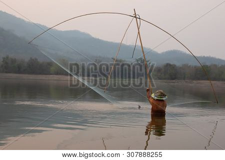 Villagers Are Catching Fish By Fish Trap (net Trap) In Reservoir