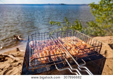 Chiken On The Grill Against The Background Of The Sea And The Beach- Paleo Food Photography.deliciou