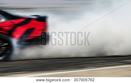 Sport Car Wheel Drifting. Blurred Of Image Diffusion Race Drift Car With Lots Of Smoke From Burning 