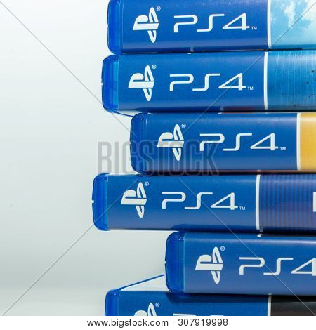 Melbourne, Australia - January 11th 2019: Ps4 Logo Showing On Game Cases Stacked Horizontally
