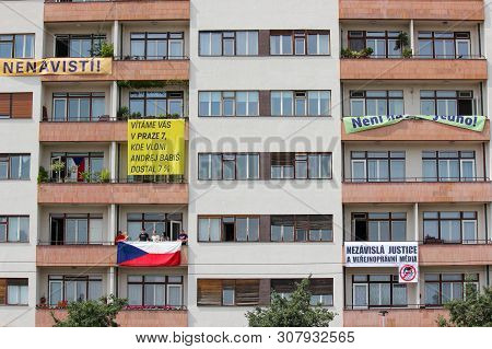 Prague, Czech Republic - June 23 2019: People On Buildings Balconies Supporting Protests Against Pri