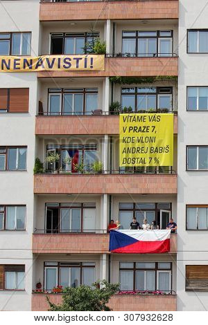 Prague, Czech Republic - June 23 2019: People On Buildings Balconies Supporting Protests Against Pri