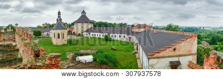 Ancient Medzhybizh Fortress Of The 14-16th Centuries. Courtyard With Castle Church Of The 16th Centu