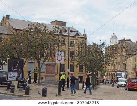 Bradford, West Yorkshire, United Kingdom - 19 June 2019: Police Community Support Officers Talk To P