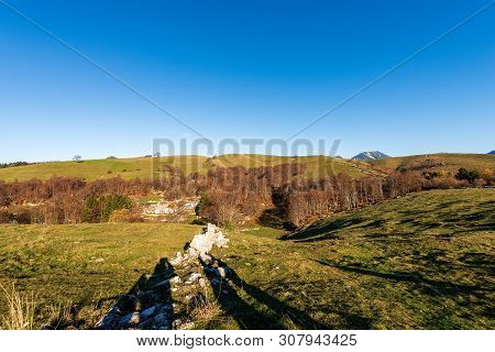 Lessinia Plateau In Autumn And Alps (carega Mountain Called Small Dolomites). Regional Natural Park 