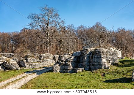 Limestone Monoliths. Unusual Karst Erosion Formations In The Regional Natural Park Of Lessinia (vall