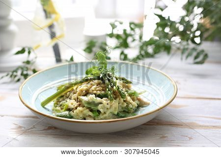 Risotto With Spinach And Green Asparagus. Appetizing Dish