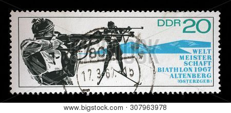 ZAGREB, CROATIA - JULY 03, 2014: A stamp issued in Germany - Democratic Republic (DDR) dedicated to biathlon world championship in Altenberg, circa 1967.