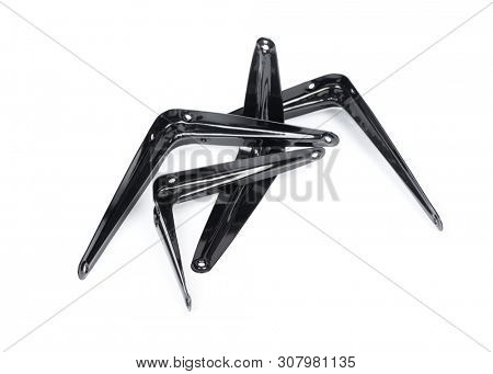 Group of  metallic angle fixators. Mounting angle corners metal brackets isolated on white background