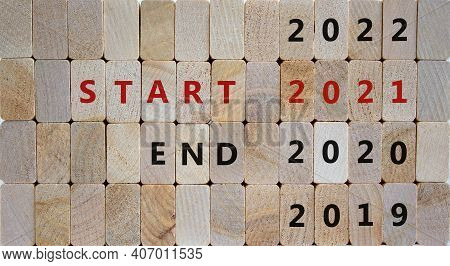 Symbol Of Start 2021 New Year. Wooden Blocks With The Words 'end 2020, Start 2021'. 2019, 2022 Numbe