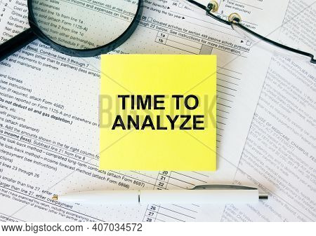 Yellow Sticker With Text Time To Analyze On Financial Docs