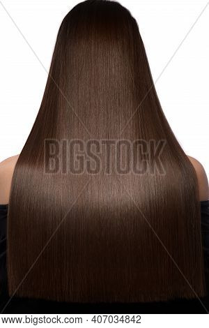 Beautiful Brown-haired Girl With A Perfectly Smooth Hair. Beauty Hair.
