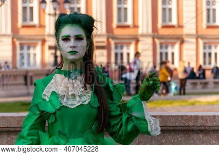 Timisoara, Romania - March 31, 2017: Woman In A Masquerade Costume Dress Posing As A Living Statue A