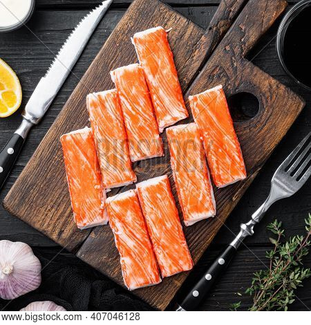 Fresh Crab Meat Stick Surimi With Blue Swimming Crab Set, On Wooden Cutting Board, On Black Wooden T