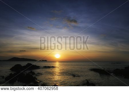 Beautiful Sunset Over The Clam Sea With Cloud Sky Background. Sunset Over Tropical Beach. Nature Sum