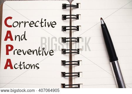 Capa Corrective And Preventive Actions, Text Words Typography Written On Book, Life And Business Mot