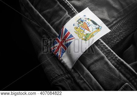 Tag On Dark Clothing In The Form Of The Flag Of The British Antarctic Territory