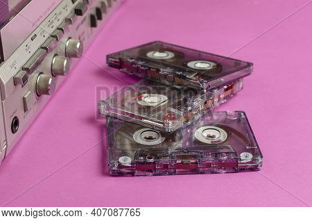 Boombox Stereo Radio Cassette Recorder And Random Cassettes On Pink Background. Vintage Cassette Dec