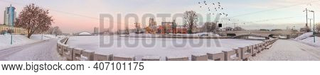Big panorama of the historical center of Minsk with Traetskae Pradmestse or Trinity Suburb and Svisloch river in winter,  Belarus