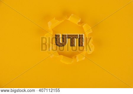 Uti Abbreviation Urinary Tract Infection, Concept, Yellow Background.