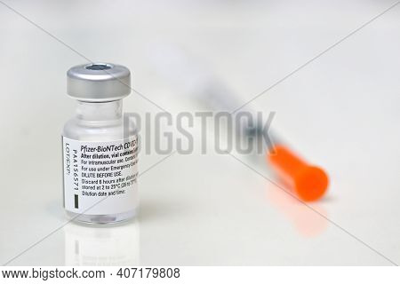 Romania, Galati, 08.02.2021 Pfizer And Biontech Covid-19 Vaccine. Small Ampoules With Vaccine
