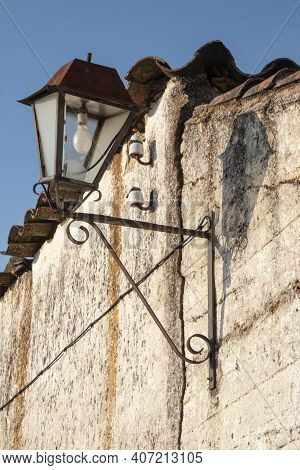 Old Broken Rustic Village Lamppost In Andalusia