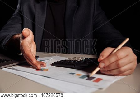 Businessman Is Showing Profit In A Chart. Investment Concept