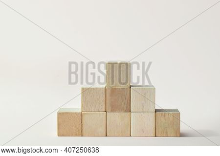 Podium For Product Presentation. Minimalistic Staircase Made Of Wooden Cubes. A Scene With Geometric