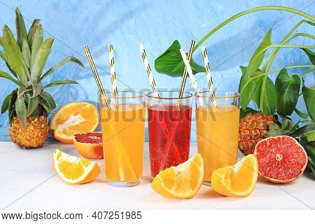 Fruit Juice And Ingredients, Summer Tropical Drinks On Bright Table With Long Shadows, Detox Diet An