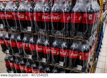 Packs Of Two-liter Plastic Bottles Of Coca-cola Carbonated Drink On Sale In The Mall 20.10. 2020 In 