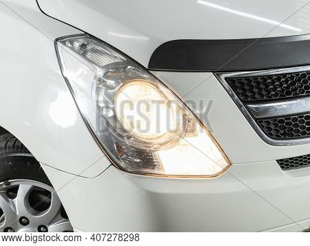 Novosibirsk, Russia - February 07 2021: Hyundai Starex, Headlight Of A Modern Popular Car Close-up. 